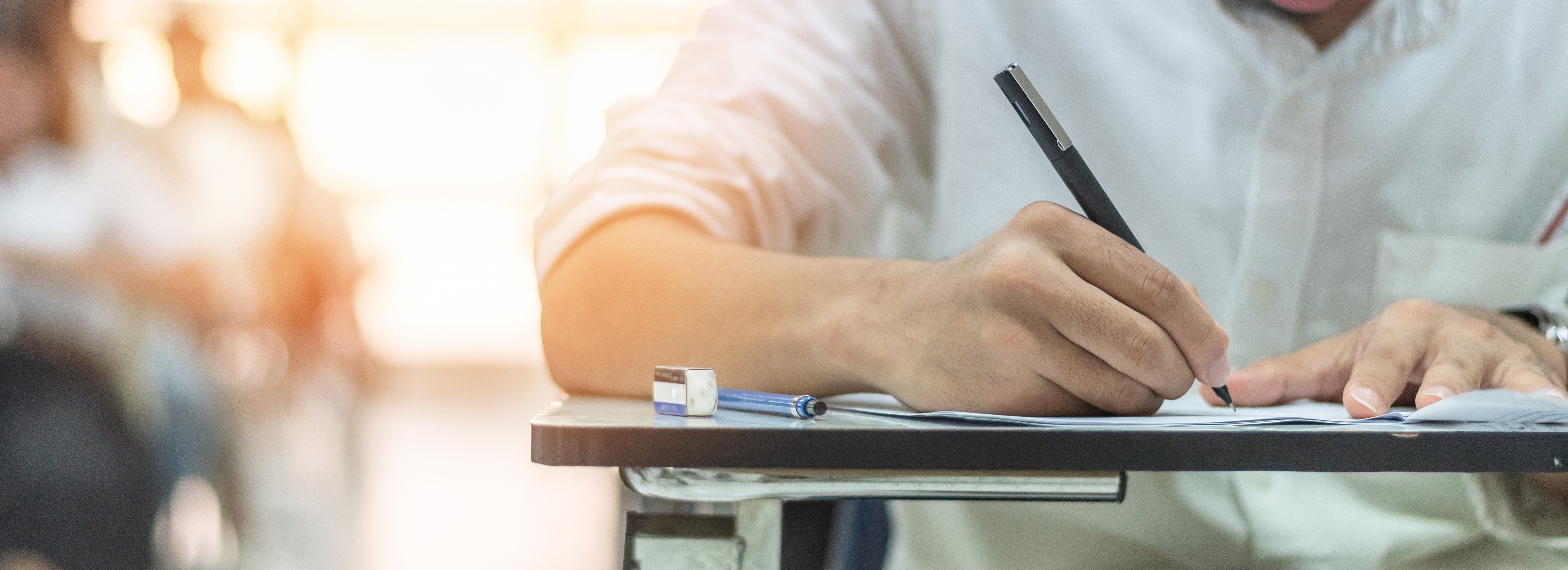 Candidate working through a timed licensing exam